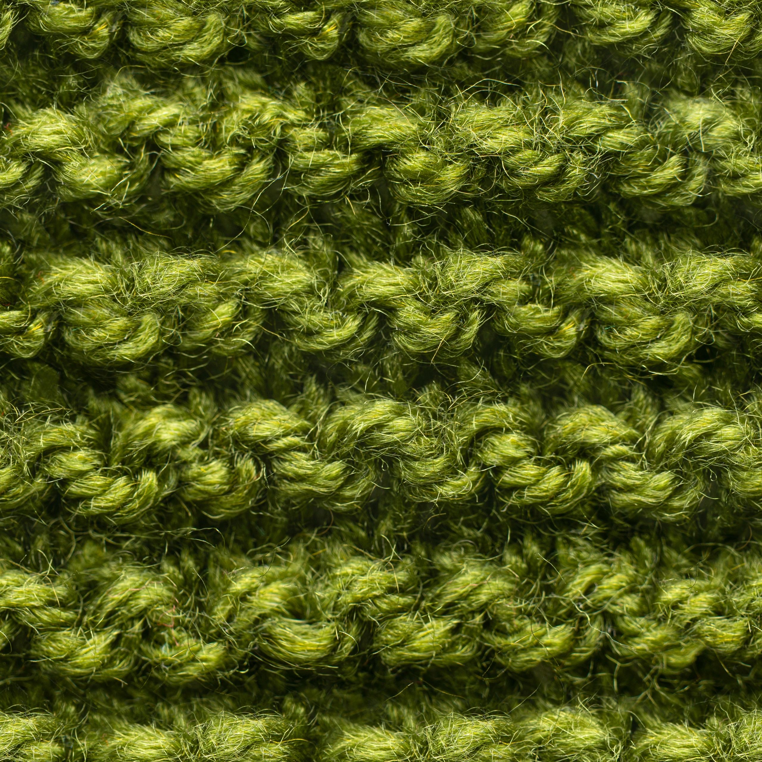 Close-up knit fabric texture with stitching detail