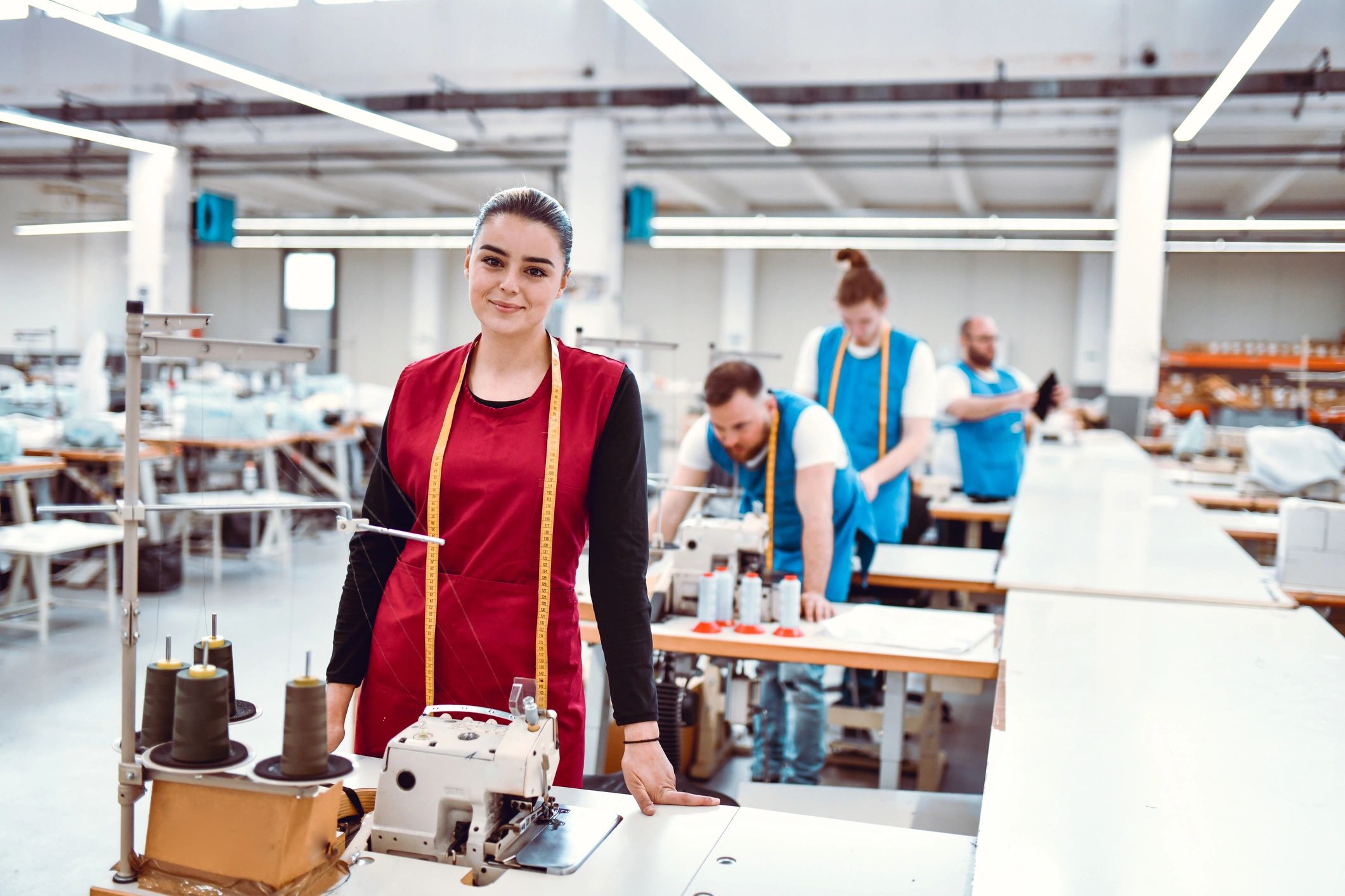 Textile worker leading a team in a garment factory